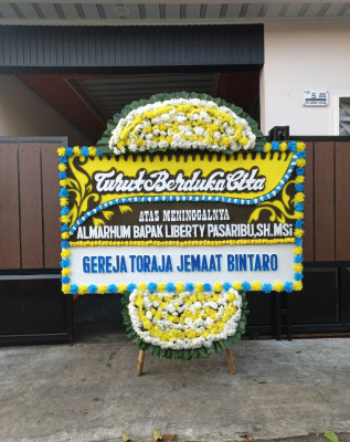 Papan Bunga Duka di Benuanirae
